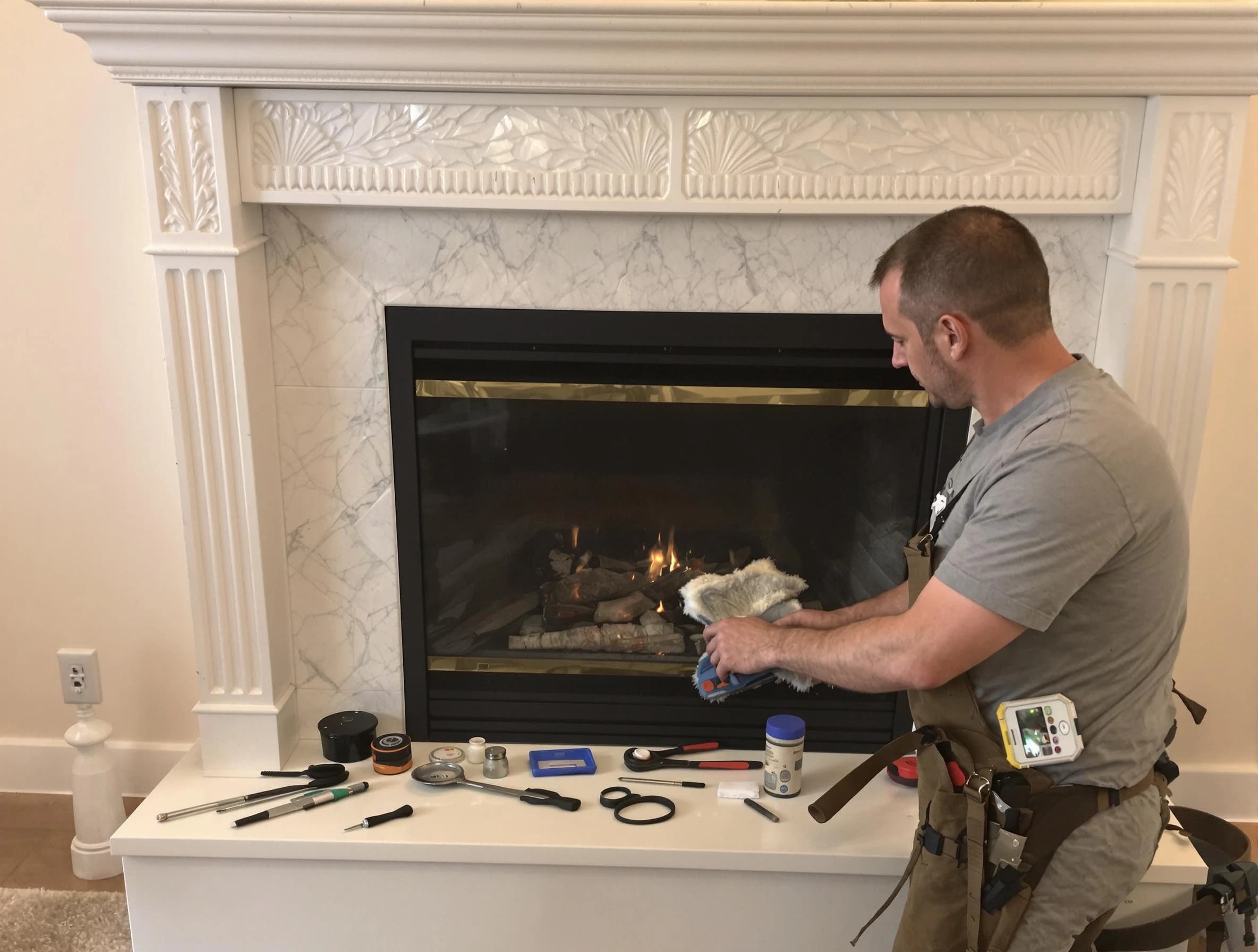 Canonsburg Chimney Sweep performing fireplace maintenance in Canonsburg, PA